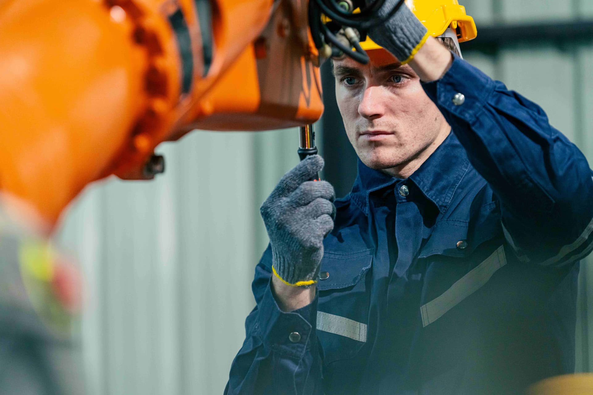 Robotics Integration technician servicing robot